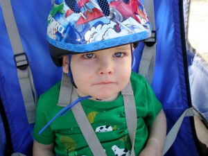 child in bicycle trailer